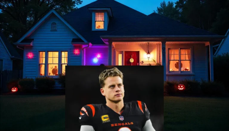 Joe Burrow standing in front of a decorated house with Halloween lights, featuring a pumpkin and festive decor.