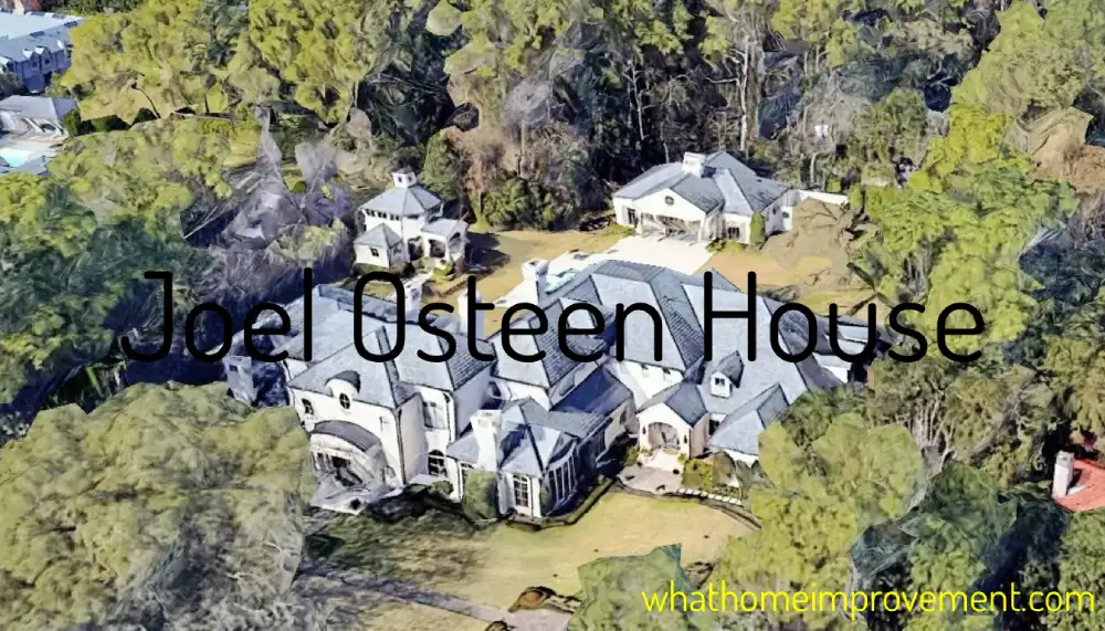 Aerial view of Joel Osteen's large stone mansion in River Oaks Houston, showing gray roof, mature trees, curved driveway and expansive landscaped grounds.